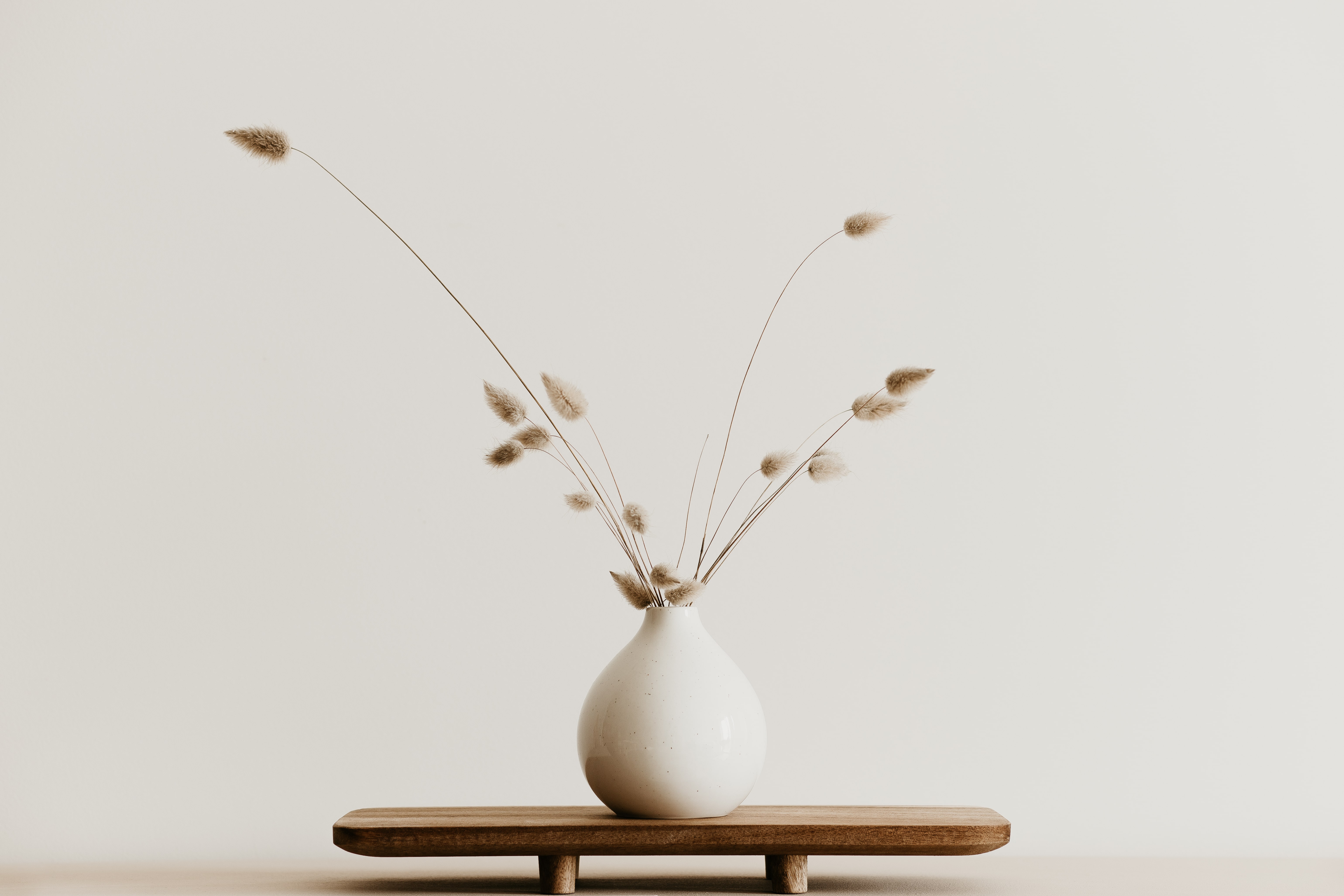 A solitary decorative vase sat on an otherwise uncluttered surface.