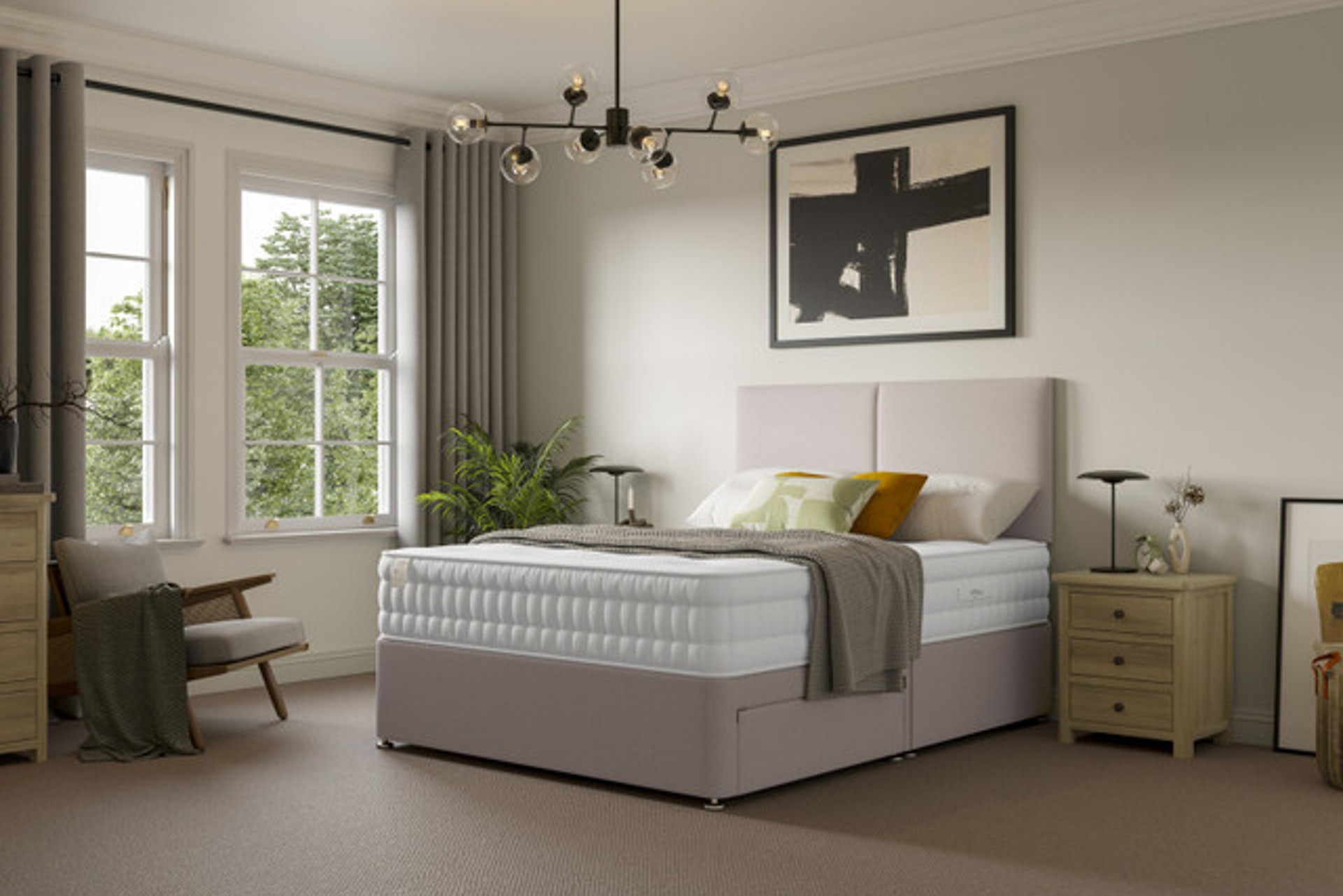 The slumberland Plant-based mattress on a grey divan bed in a modern minimalist bedroom