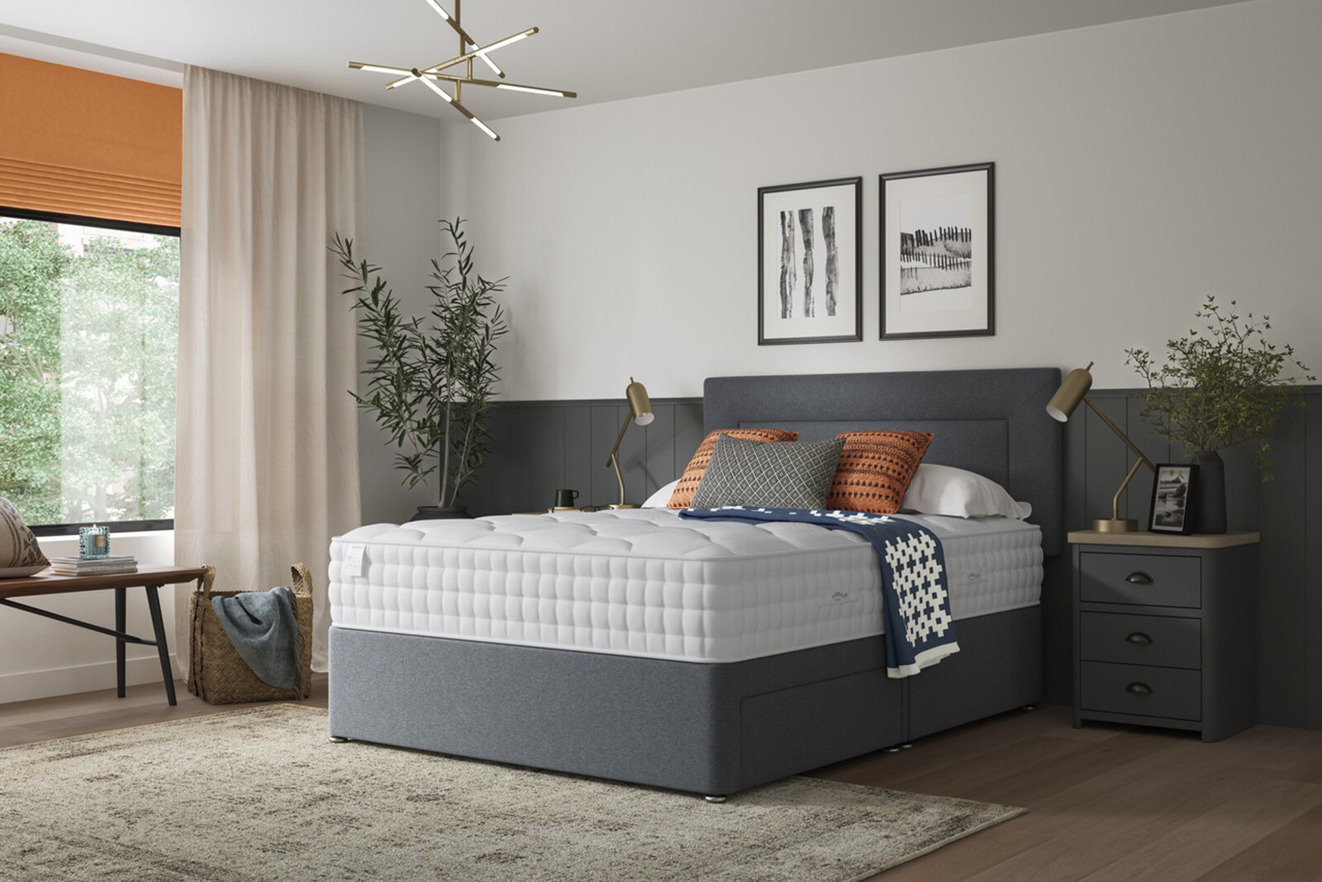 The Slumberland Premium wool mattress on a dark charcoal grey divan bed in a contemporary bedroom